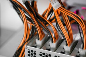 close-up-cryptocurrency-mining-cable-orange-lights
